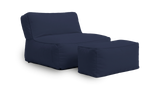 Navy blue bean bag chair and ottoman on a white background
