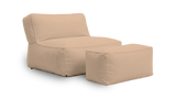 Beige modular sofa with ottoman on a white background